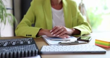 Businesswoman gesturing with her hands and remotely communicating with client. Online education and consultation