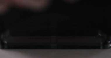 Person to puts stamp seal approved stamp closeup. Obtaining a visa, residence permit or banking solution