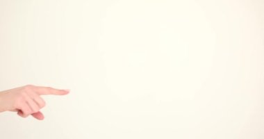 Woman shows hand index finger to side. Gesture dismissal go away and indicate direction