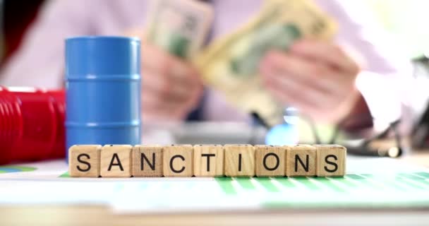 Sanctions Inscription Wooden Cubes Close Oil Market Profit Fuel Deficiency — Stockvideo