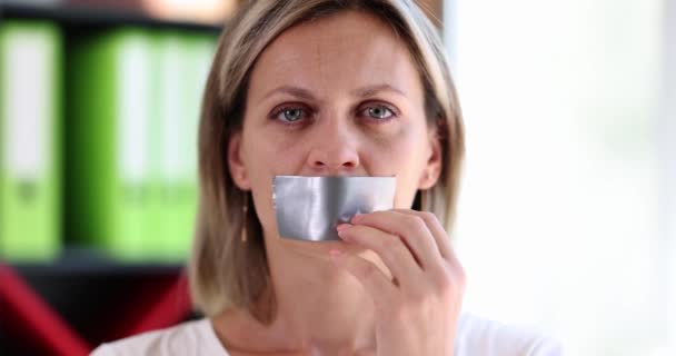 Woman Office Removes Sticky Tape Mouth Close Concept Freedom Speech — 图库视频影像