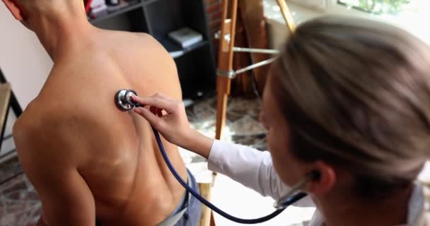 Doctor Pulmonologist Conducting Auscultation Lungs Back Patient Movie Slow Motion — Video Stock