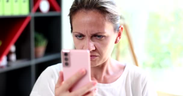 Astonished Woman Poor Eyesight Looking Mobile Phone Screen Movie Slow — Stock video
