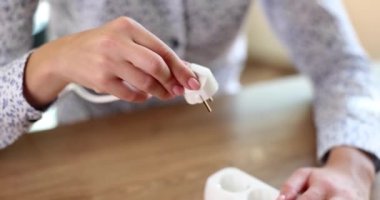 Closeup of hand inserting electric plug to save energy. Electricity tariffs