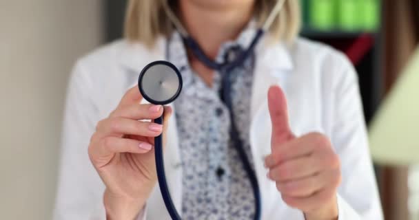Doctor Showing Stethoscope Thumb Sign Health Care Insurance Services Medicine — Vídeo de stock