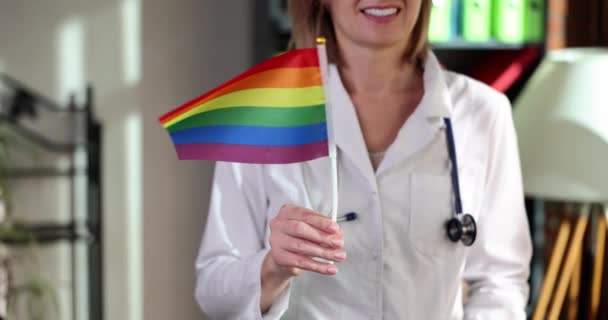 Hands Female Doctor Lgbt Flag Waving Clinic Office Medical Assistance — Stok Video