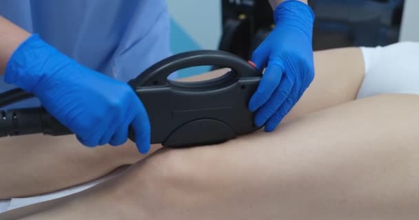 Beautician Removes Hair Beautiful Female Legs Laser Epilation Legs Laser — Stock Video
