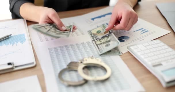Person Counts Cash Money Dollar Business Charts Handcuffs Table Corruption — 图库视频影像