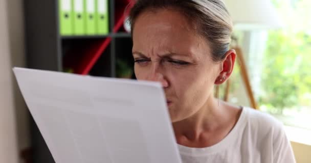 Concentrated Woman Poor Eyesight Trying Read Papers Woman Squinting Seeing — Stockvideo