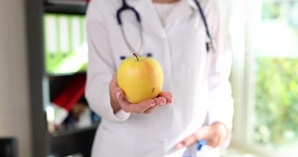 Yellow Fresh Apple Hand Female Doctor Closeup Healthy Food Diet — Wideo stockowe
