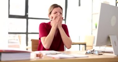 Laughing happy woman at workplace in office. Emotions of joy success happiness