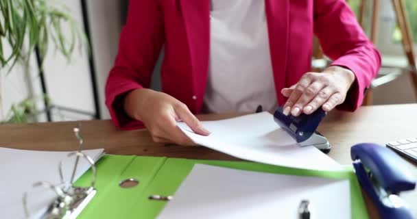 Closeup Hands Using Hole Punch Staple Documents Office Secretary Working — Stockvideo