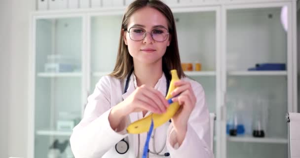 Doctor Urologist Surgeon Holds Banana Measuring Tape Hands Erectile Dysfunction — Stockvideo