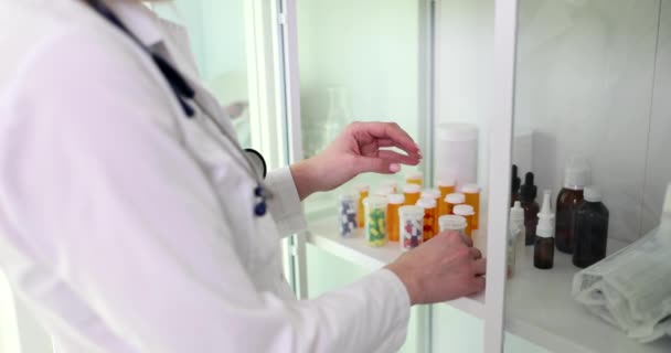 Doctor Pharmacist Chooses Medical Capsules Pills Cabinet Pharmaceutical Research Drug — Stockvideo