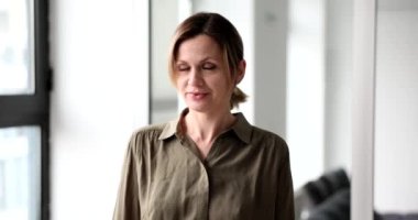 Emotional young woman winces and rolls eyes. Woman expresses annoyance angry or bored
