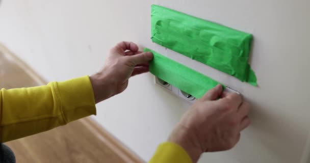 Electrical Outlet Sealed Green Adhesive Tape Prevent Dust Entering Repair — Wideo stockowe