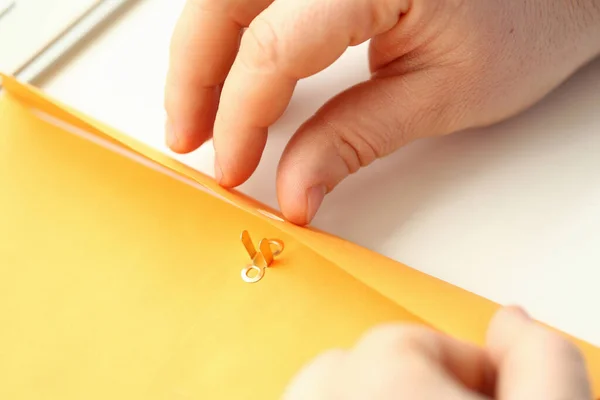 Closeup Business Person Opening Yellow Envelope Business Mail Business Correspondence — Photo