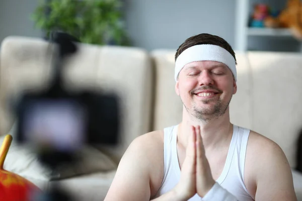 Calm Young Male Blogger Clasps Hands Namaste Gesture Peaceful Look — 스톡 사진
