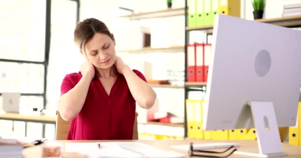 Tired Woman Sits Computer Massages Pain Neck Negative Effects Sedentary — Stock Video