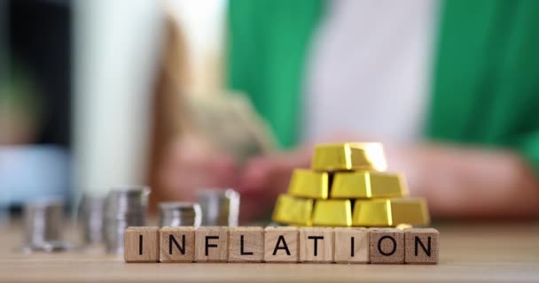 Word Inflation Gold Bars Stacks Coins Office Table Concept Financial — Stock Video