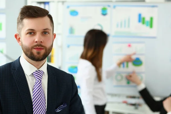 stock image Portrait of handsome businessman consultant coach at marketing conference. Mentor and financial analytics development concept