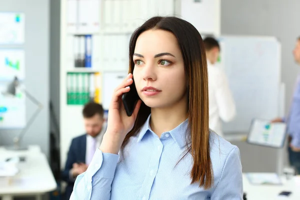 stock image Portrait of beautiful businesswoman with phone in office. Business consultant and stay connected concept