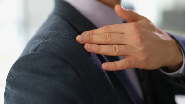 Businessman Business Suit Brushing Dust Dandruff His Shoulder Closeup Let — Stock Photo, Image