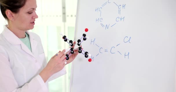 Serious Woman Examines Molecules Chemical Compounds Holding Model Hands Chemist — Stock Video