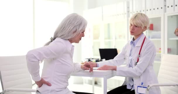 Elderly Woman Patient Complaining Pain Kidney Area Doctor Therapist Clinic — Stock Video