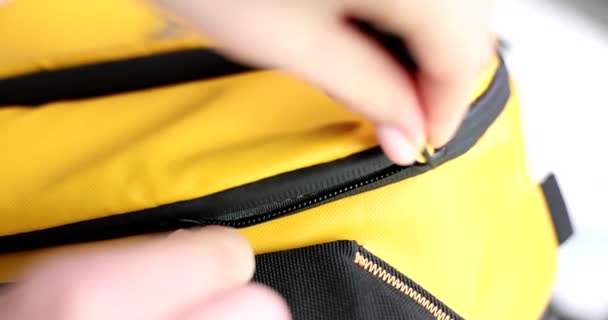 Person Closes Black Padlock Yellow Fabric Backpack Closeup Quality Zipper — Stock Video