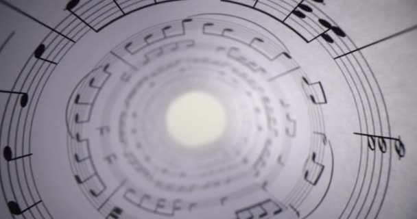 Libro Blanco Con Notas Musicales Enrolladas Cerca Luz Brillante Concepto — Vídeos de Stock
