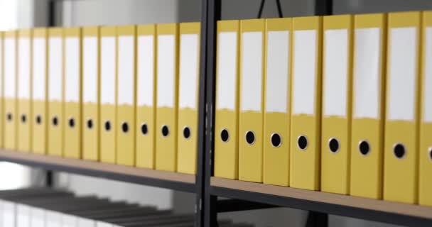 Yellow Folders Materials Documents Arranged Shelves Storage Business Documentation Service — Stock Video