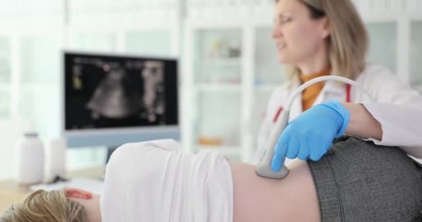 Doctor Pediatrician Conducting Ultrasound Examination Kidneys Child Clinic Movie Slow — Stock Video