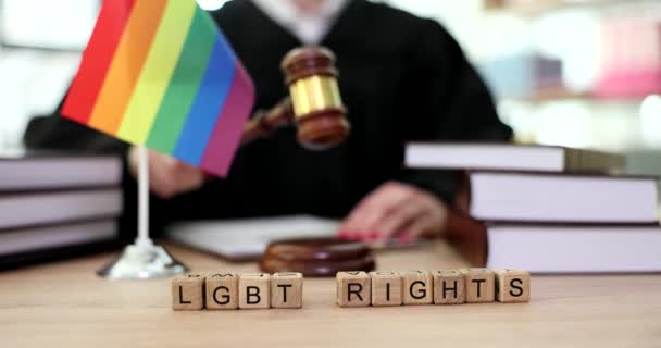 Lgbt Rights Word Rainbow Flag Judge Courtroom Closeup Movie Slow — Stock Video