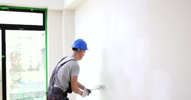 Builder Paints Wall House Roller Brush Concept Decorating Improving Interior — Stock Video