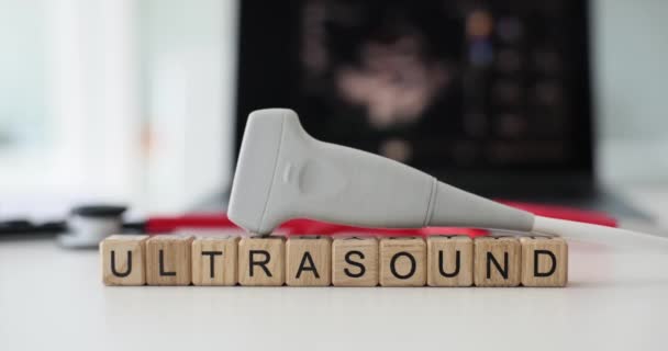 Word Ultrasound Made Wooden Cubes Medical Transducer Blurred Screen Image — Stock Video