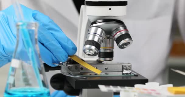 Chemist Laboratory Checks Strips Microscope Exploring Toxic Poisonous Acidic Liquids — Stock Video