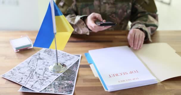 Military Spy Photographing Top Secret Document Planning Counteroffensive Ukrainian Troops — Stock Video