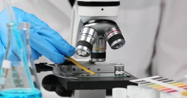 Scientist Chemist Holds Hands Liquid Test Microscope Closeup Chemical Analysis — Stock Video