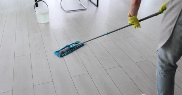 Female Rubber Gloves Cleans Floor Wet Mop Renovated Apartment Cleaning — Stock Video
