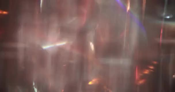 Mor Pembe Parıltılı Işıklar Arka Planda Koyu Arkaplanda Işıldayan Işık — Stok video