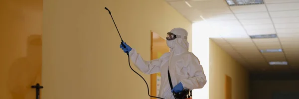 Contractor Disinfects Office Corridor Coronavirus Covid Disinfectant Protective Suit Mask — Zdjęcie stockowe