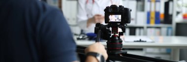 Operator removes doctor medical consultation on camera. Medical blog and online treatment concept