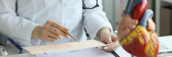 Cardiologist Doctor Holding Reading Ecg Paper Report Patient Heart Disease — Stok fotoğraf