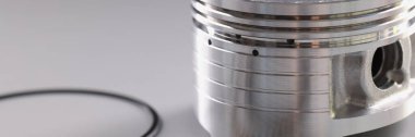 Spare part engine piston and rings for auto repair. Component engine repair concept