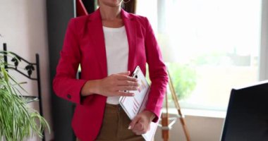 Business woman extends hand for handshake greeting in office. Nice to meet you and partnership