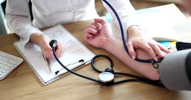 Therapist Cardiologist Using Tonometer Checks Patient Blood Pressure Arterial Hypertension — Stok video