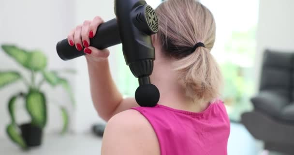 Woman Uses Percussion Gun Her Neck Massage Close Muscle Relaxation — Stock Video