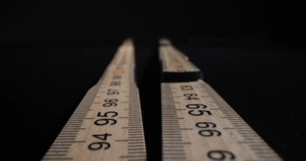Folding Wooden Ruler Black Background Measurement Exact Indicators — Stock Video
