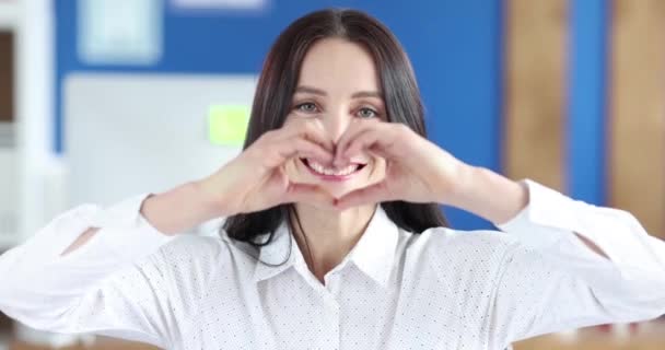Smiling Woman Showing Heart Gesture Movie Slow Motion Positive Mood — Stock videók
